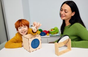 ABA Therapist helping child